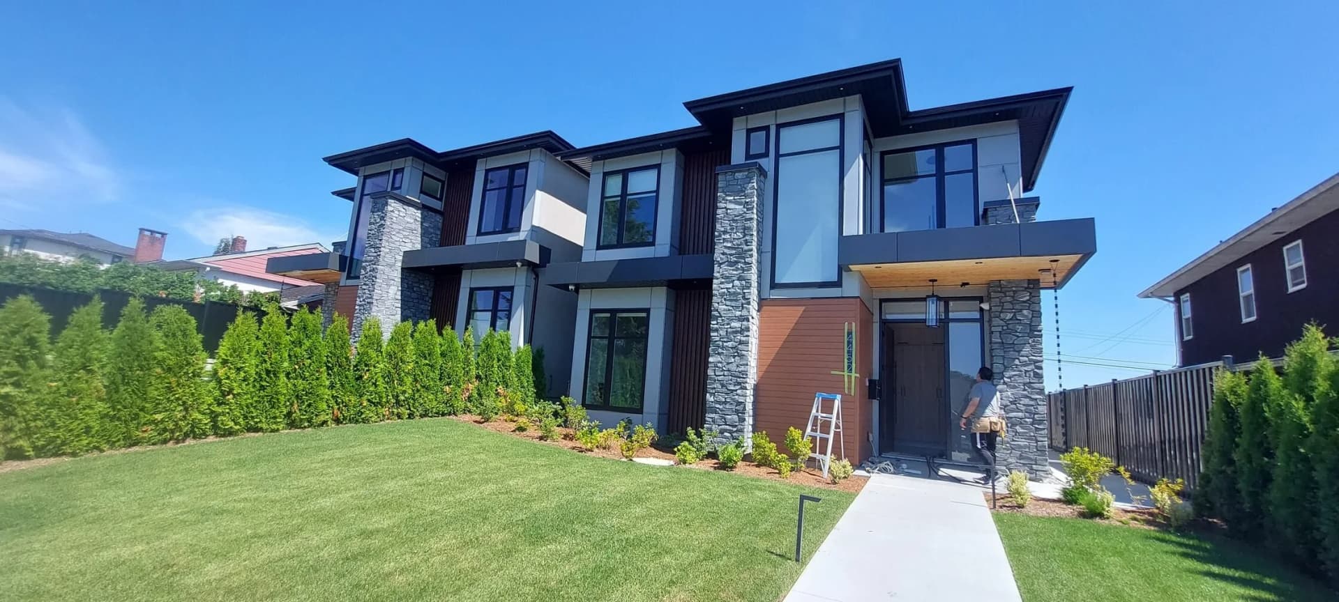 Siding and building envelope repair with weather barrier by Tomron Construction in Coquitlam, BC