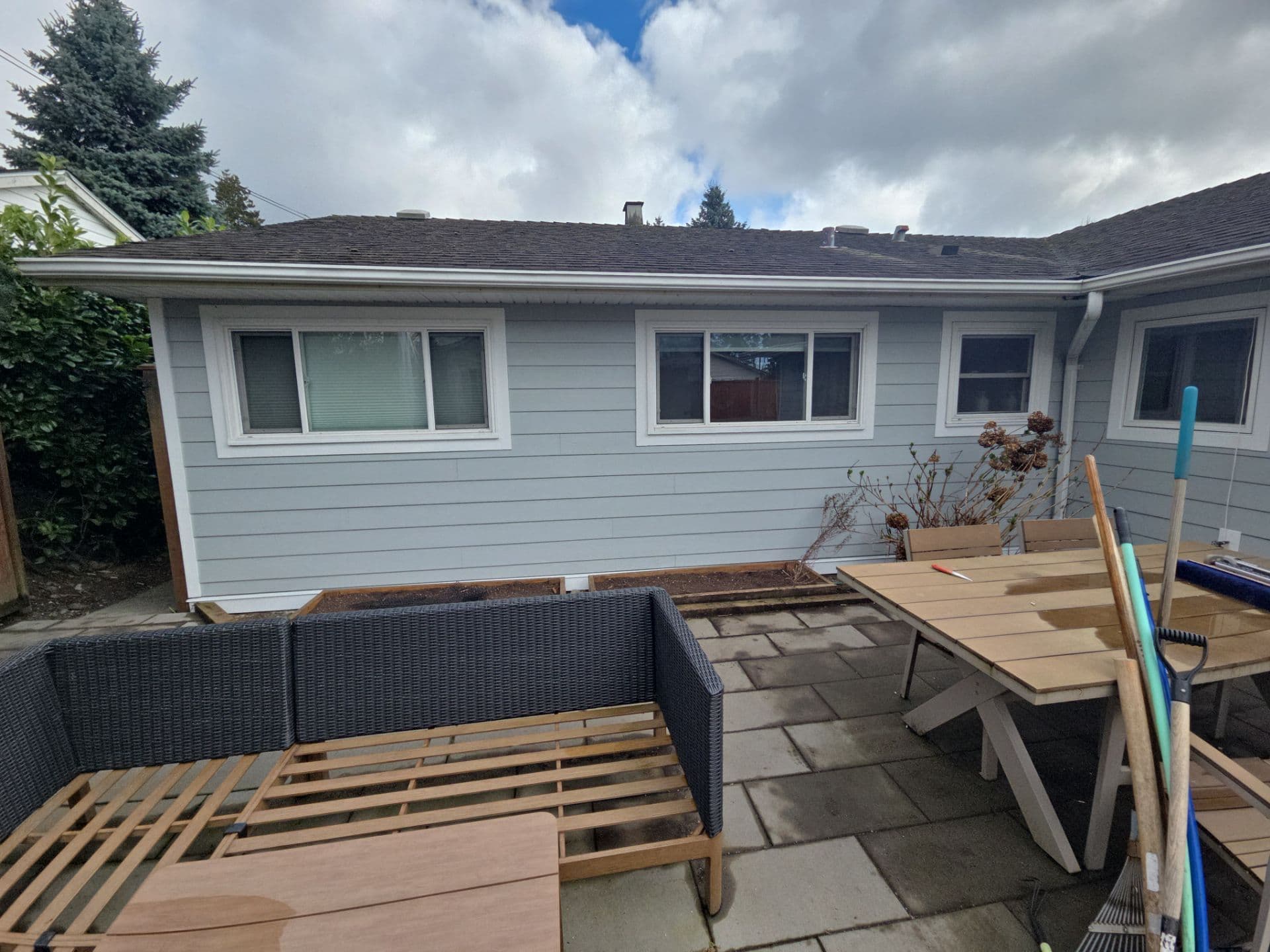 Completed James Hardie siding, rear elevation by Tomron Construction in Maple Ridge, BC