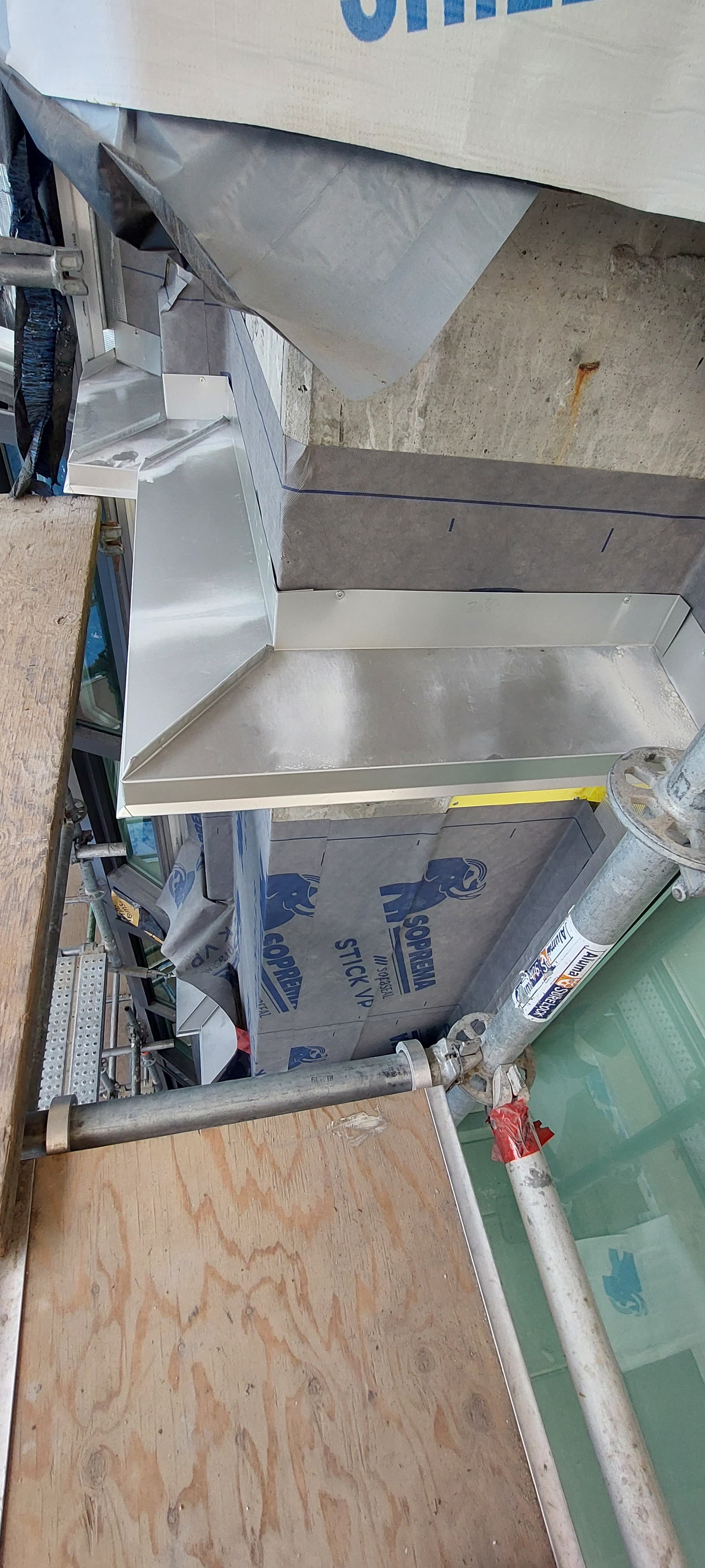 Chimney flashing with counter-flashing detail by Tomron Construction in Maple Ridge, BC